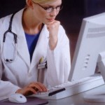 Doctor using a computer.